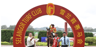 William Looi (right) kicked off his career as a trainer in his own right in the best way possible at Selangor.