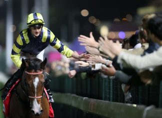 The man on the hour. Harry Bentley rings up a double at Happy Valley on Wednesday night.