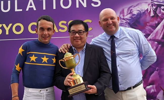 The same winning trio hogs the limelight again after Lim's Bighorn's victory: (from left) jockey Marc Lerner, owner Mr Lim Siah Mong and trainer Daniel Meagher.