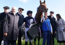 Aidan O’Brien (far left) with Ryan Moore and winning connections of City Of Troy (Tim Goode for The Jockey Club)